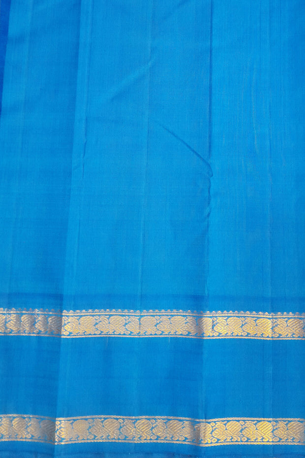 Kanchi pure silk saree in peacock green with  double border and a contrast pallu