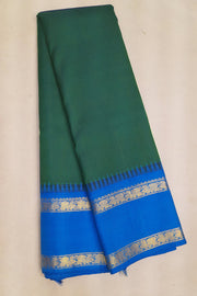 Kanchi pure silk saree in peacock green with  double border and a contrast pallu
