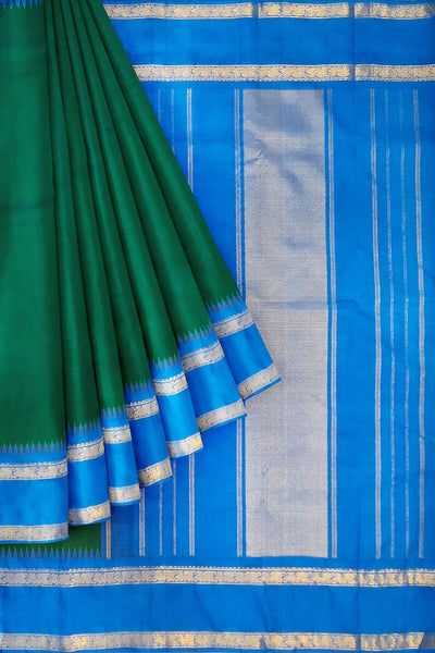 Kanchi pure silk saree in peacock green with  double border and a contrast pallu