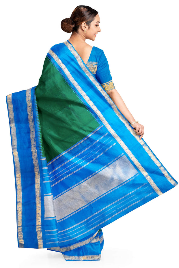 Kanchi pure silk saree in peacock green with  double border and a contrast pallu