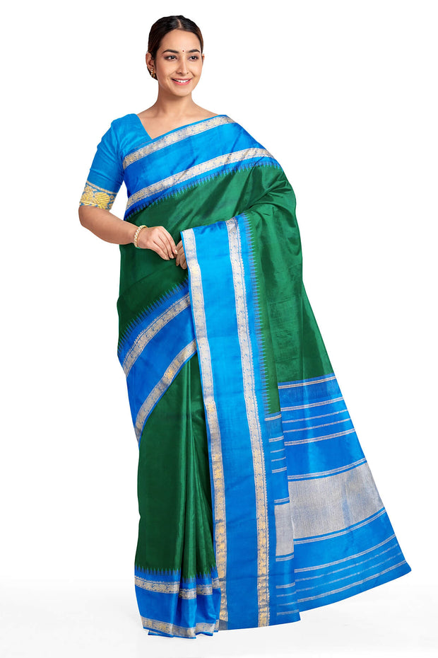 Kanchi pure silk saree in peacock green with  double border and a contrast pallu