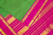 Kanchi pure silk sare in green & black checks  with double border