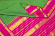 Kanchi pure silk sare in green & black checks  with double border