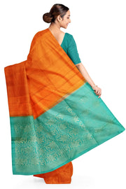 Kanchi soft silk saree in orange with small motifs on the body and floral vines in pallu