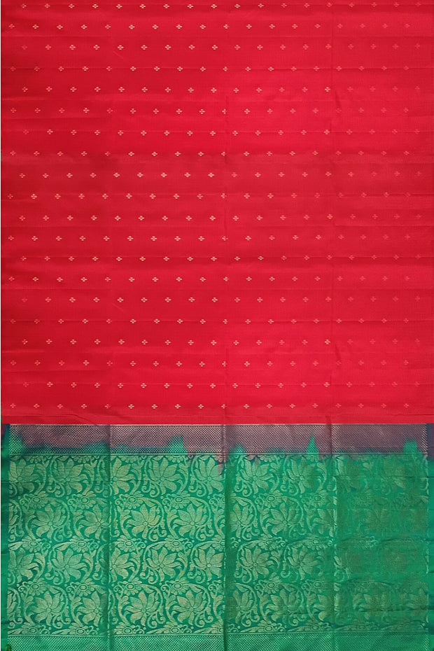 Kanchi soft silk saree in red with small motifs on the body and floral vines in pallu