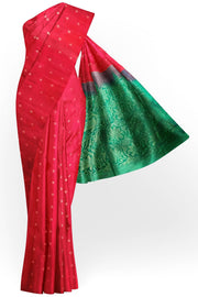 Kanchi soft silk saree in red with small motifs on the body and floral vines in pallu