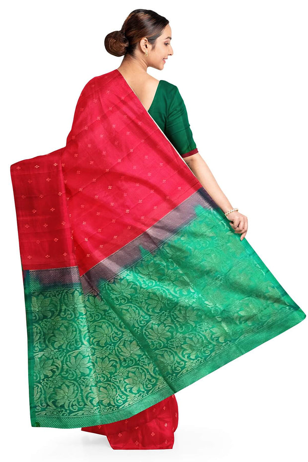 Kanchi soft silk saree in red with small motifs on the body and floral vines in pallu