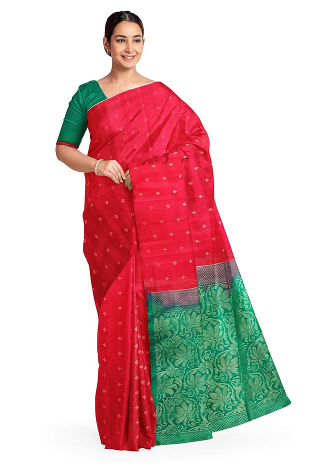 Kanchi soft silk saree in red with small motifs on the body and floral vines in pallu