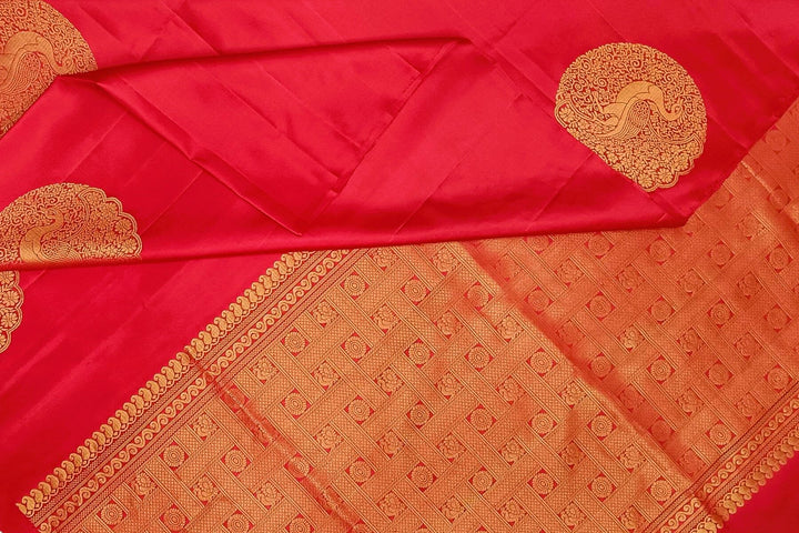 Kanchi soft silk saree in red with peacock motifs in gold