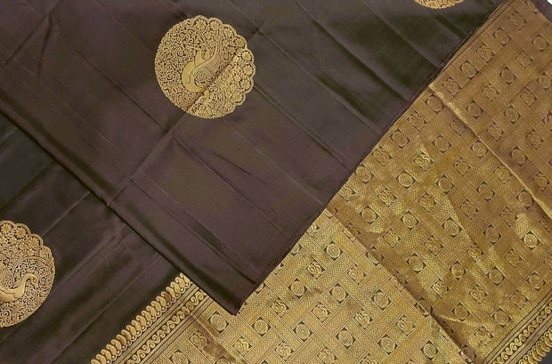 Kanchi soft silk saree in cofee brown with peacock motifs in gold