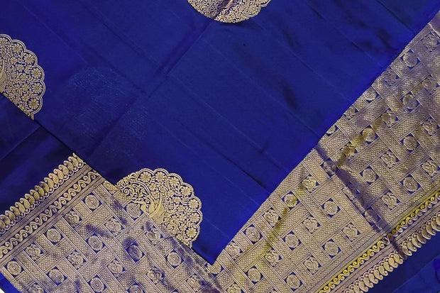 Kanchi soft silk saree in royal blue with peacock motifs in gold