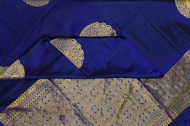 Kanchi soft silk saree in royal blue with peacock motifs in gold