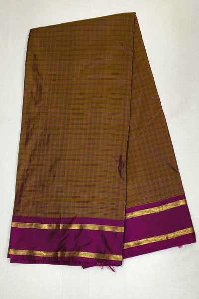 Kanchi  pure silk saree in checks in double shaded mustard ( 9 yards )