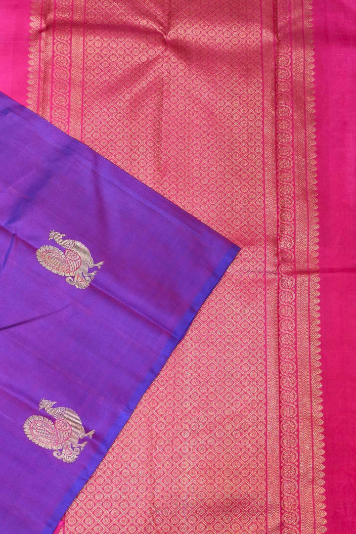 Kanchi borderless pure silk saree in  purple  with peacock motifs