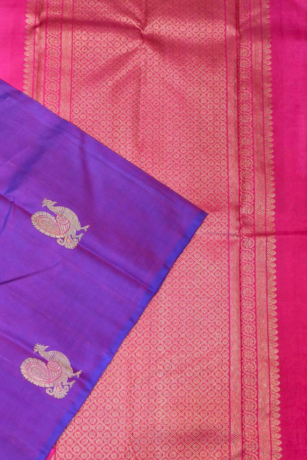 Kanchi borderless pure silk saree in  purple  with peacock motifs