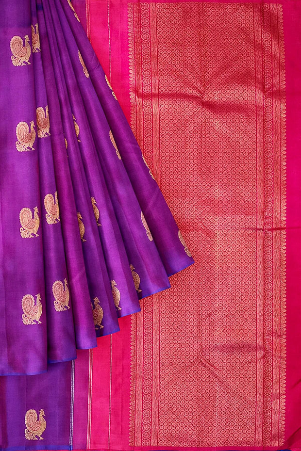 Kanchi borderless pure silk saree in  purple  with peacock motifs