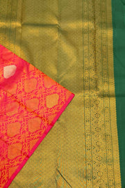 Kanchi  pure silk  brocade saree in pink  with floral vines and  motifs in gold & silver