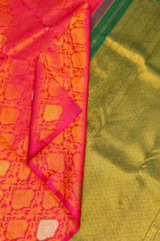 Kanchi  pure silk  brocade saree in pink  with floral vines and  motifs in gold & silver