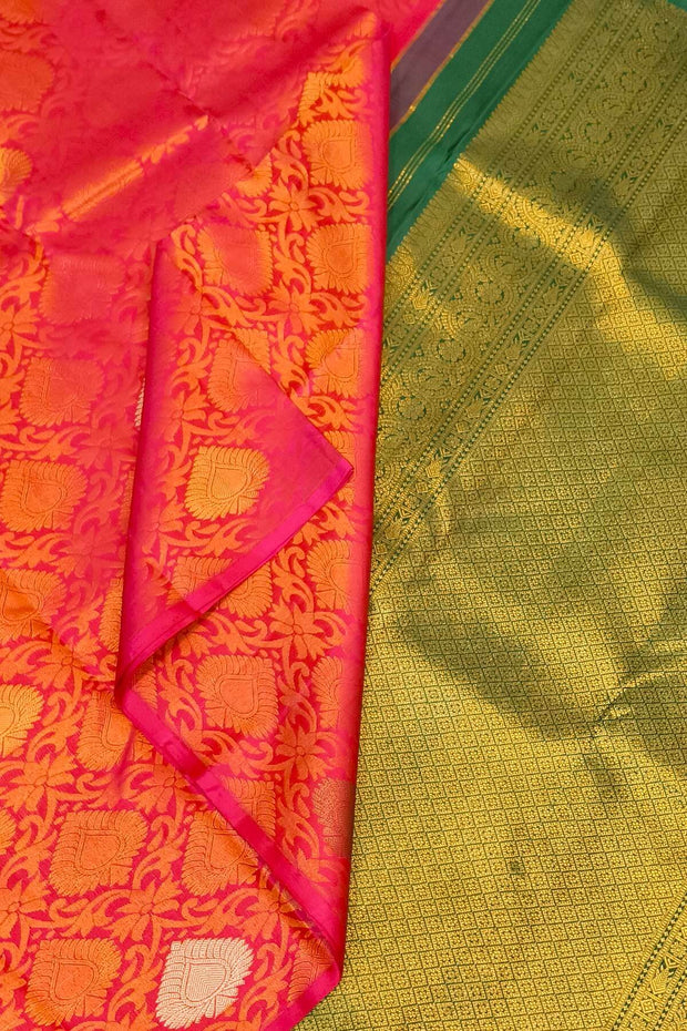 Kanchi  pure silk  brocade saree in pink  with floral vines and  motifs in gold & silver