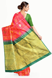 Kanchi  pure silk  brocade saree in pink  with floral vines and  motifs in gold & silver