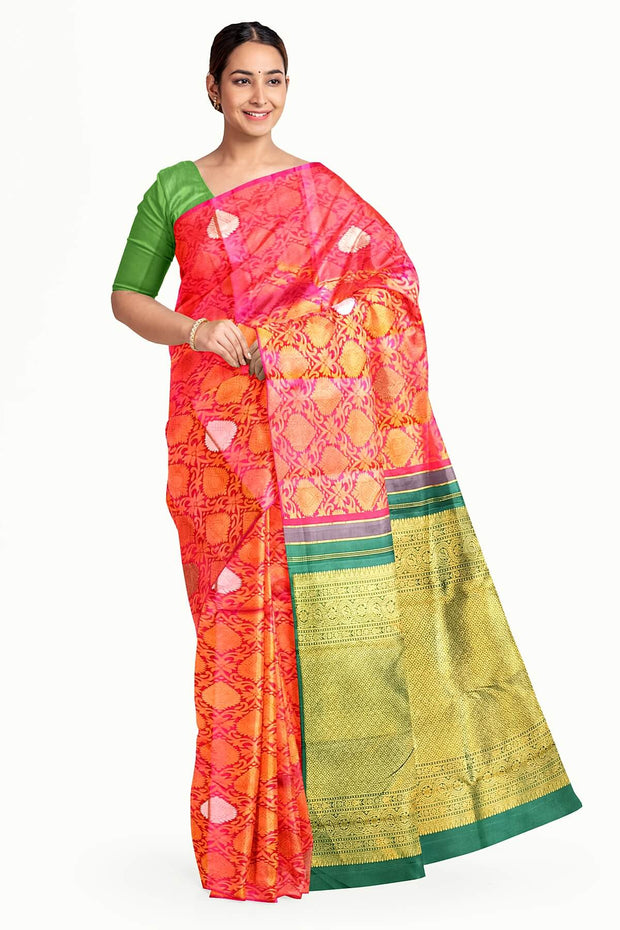 Kanchi  pure silk  brocade saree in pink  with floral vines and  motifs in gold & silver