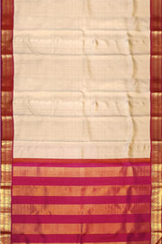 Kanchi pure silk saree in beige with  paisley motifs in the border