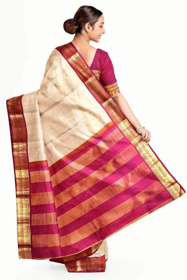 Kanchi pure silk saree in beige with  paisley motifs in the border