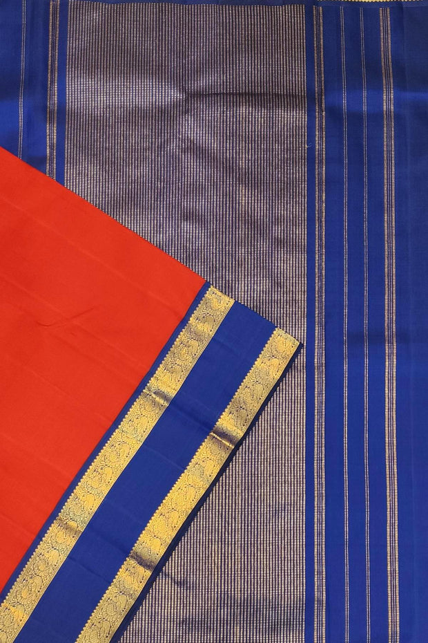 Kanchi pure silk saree in red  with a  retapet border
