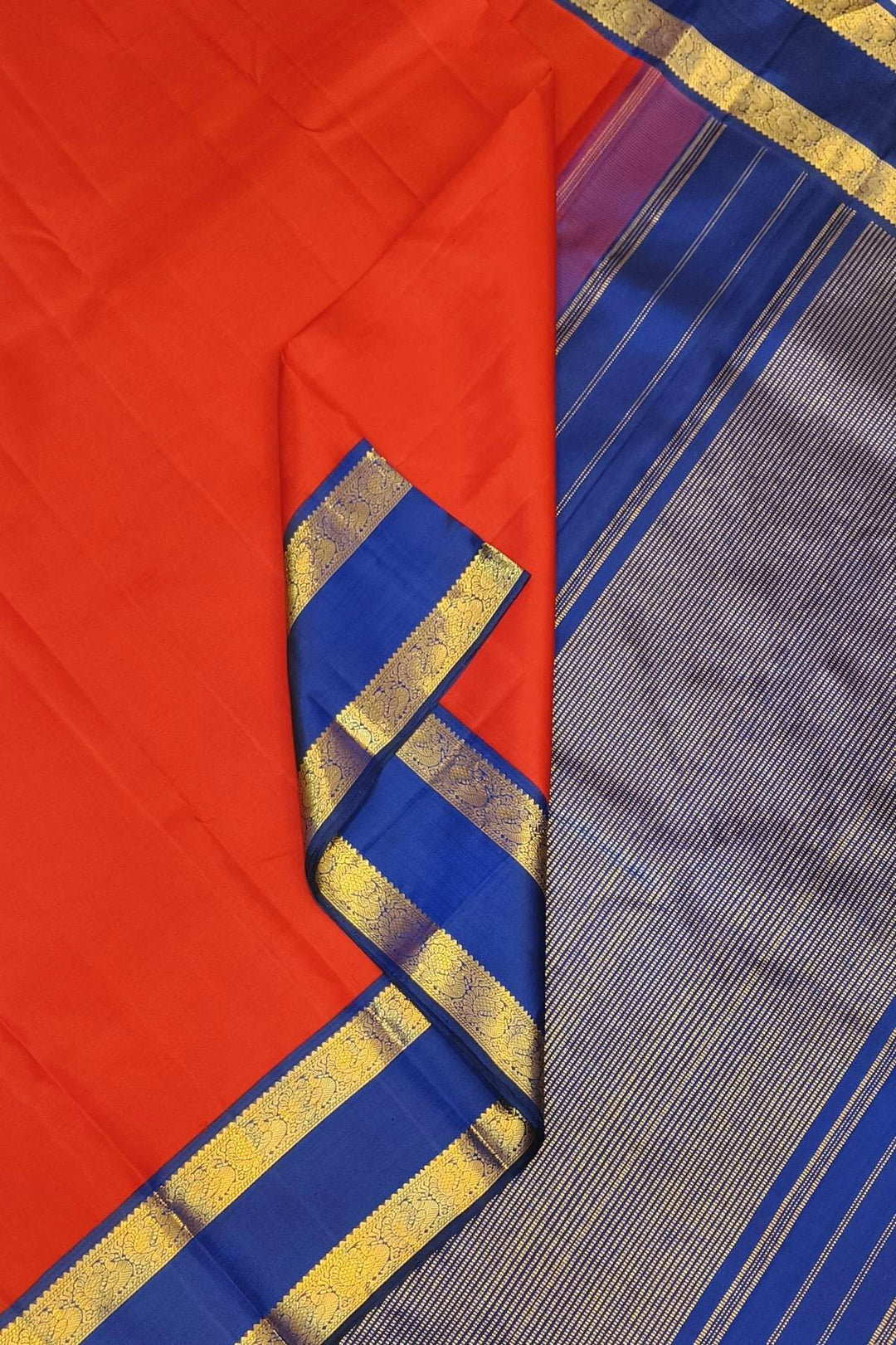 Kanchi pure silk saree in red  with a  retapet border