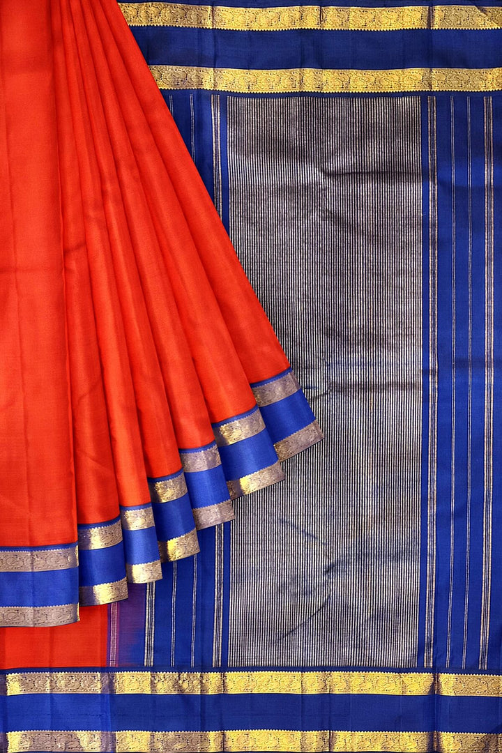 Kanchi pure silk saree in red  with a  retapet border