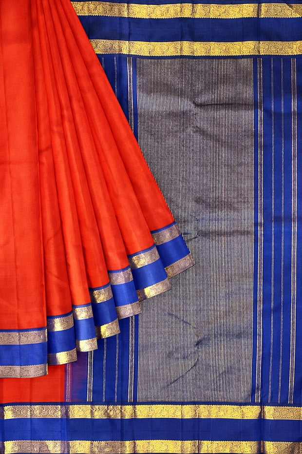 Kanchi pure silk saree in red  with a  retapet border