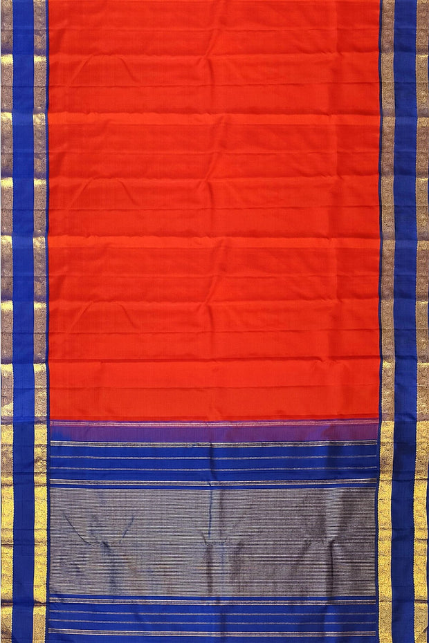 Kanchi pure silk saree in red  with a  retapet border