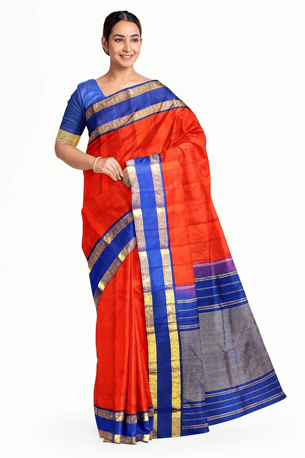 Kanchi pure silk saree in red  with a  retapet border