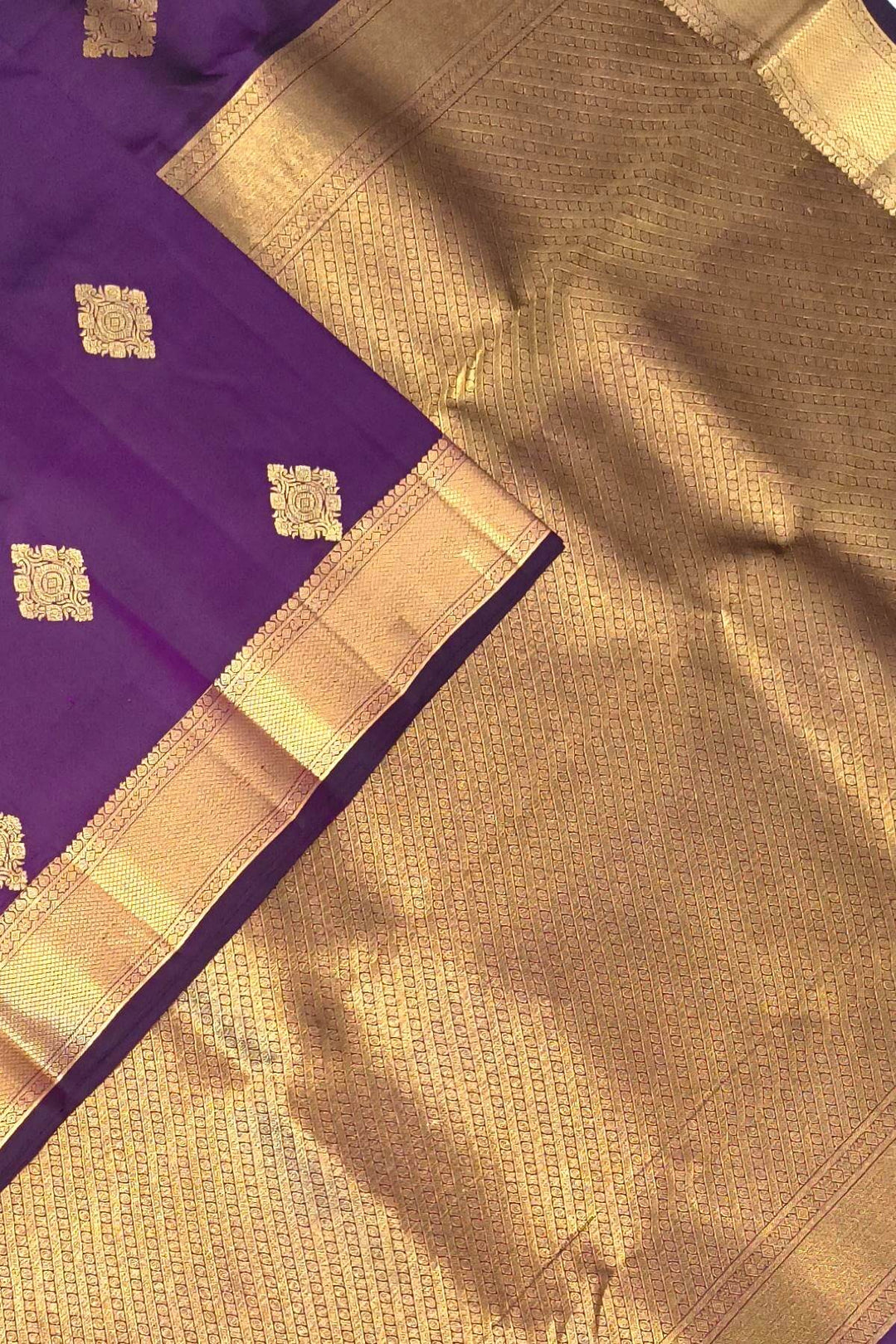 Kanchi pure silk saree in purple with floral motifs