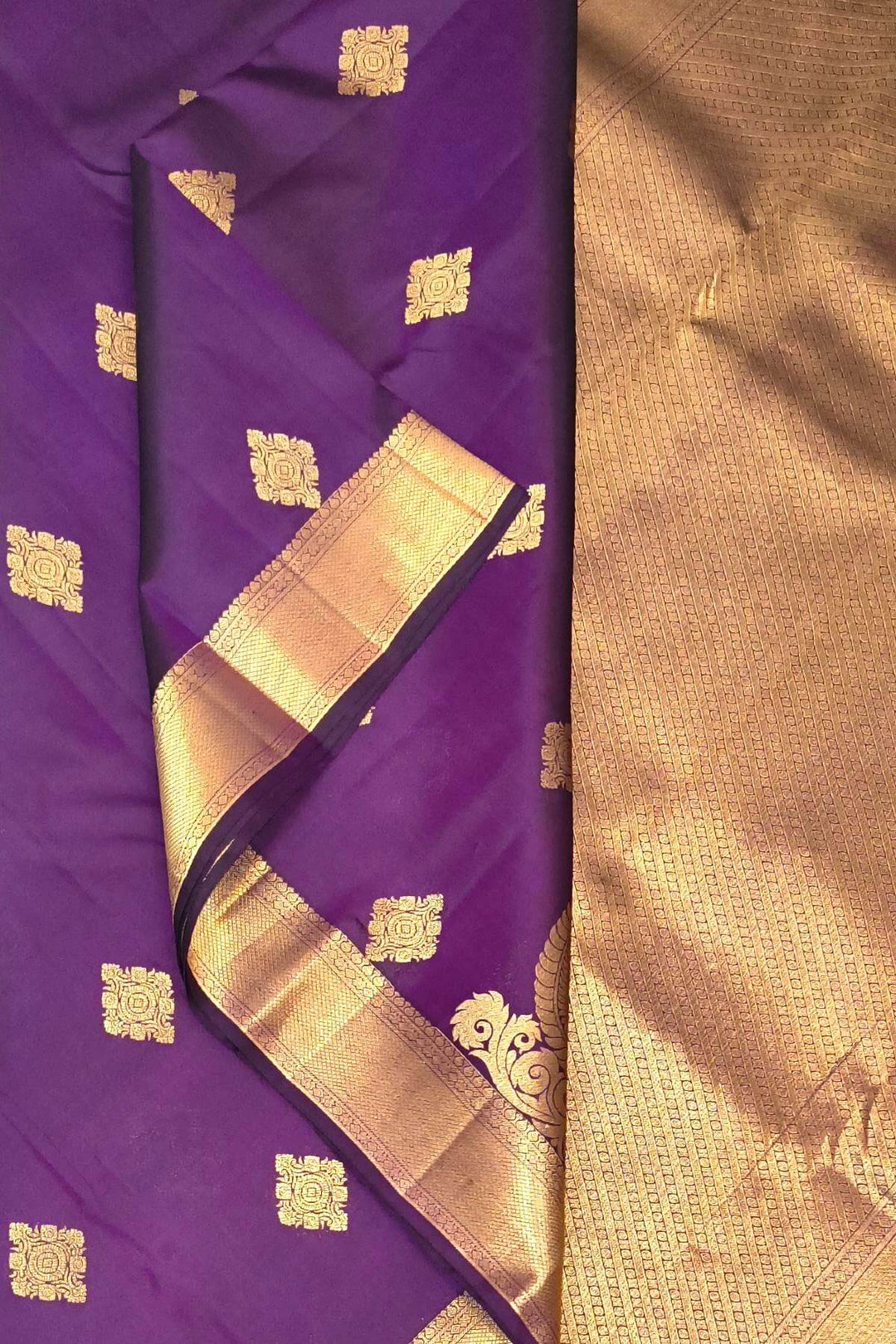Kanchi pure silk saree in purple with floral motifs