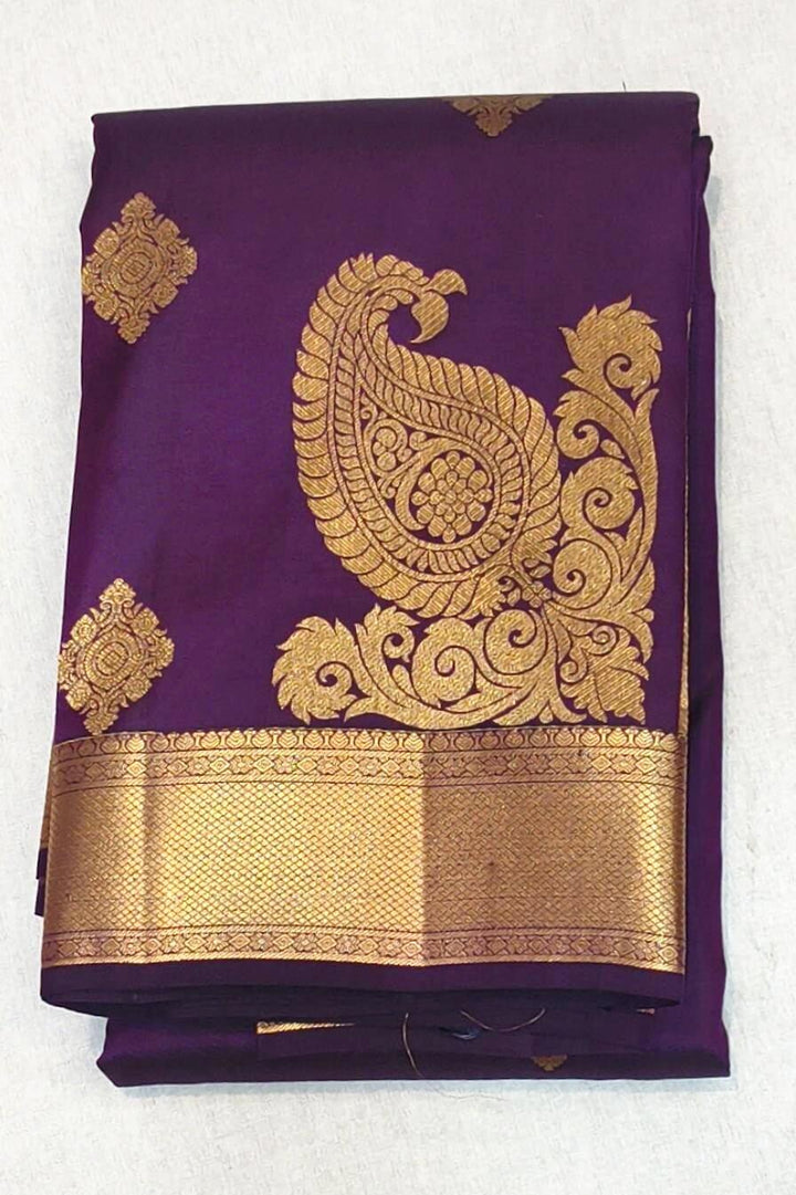 Kanchi pure silk saree in purple with floral motifs