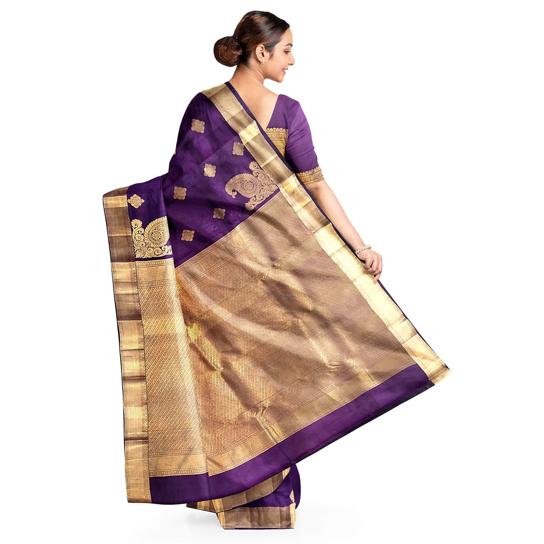 Kanchi pure silk saree in purple with floral motifs