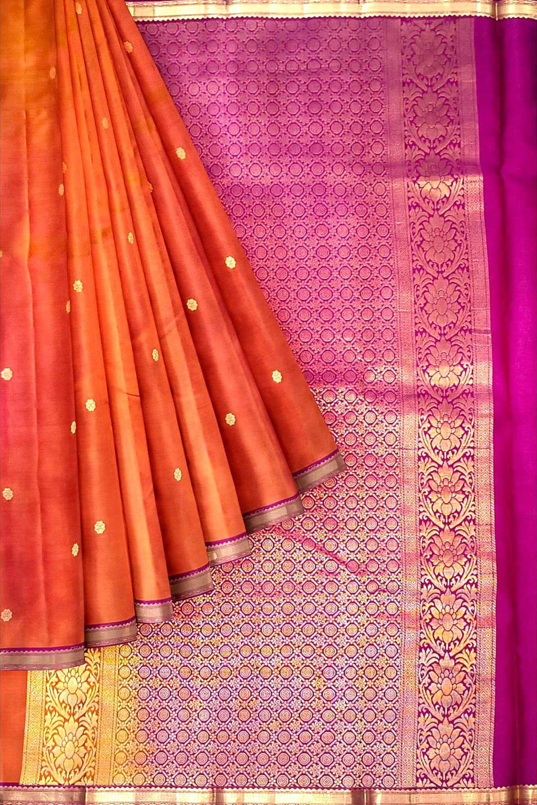 Kanchi pure silk saree in rust colour with small motifs