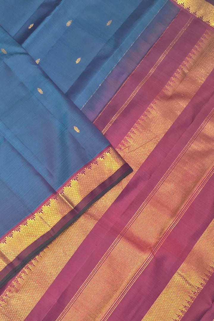 Kanchi pure silk saree in peacock blue with small motifs