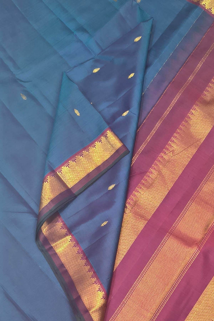 Kanchi pure silk saree in peacock blue with small motifs