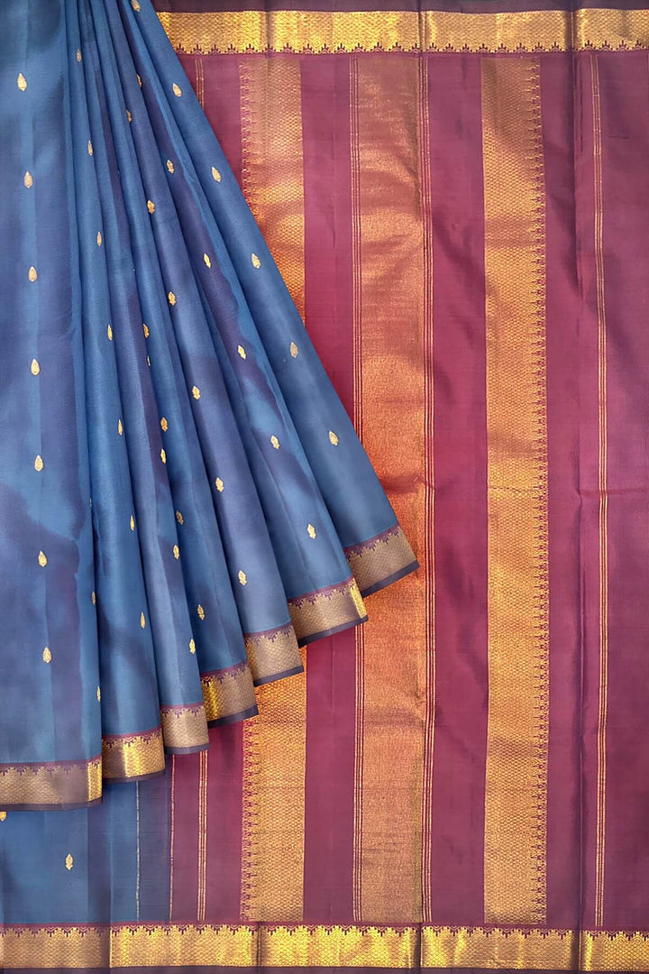 Kanchi pure silk saree in peacock blue with small motifs
