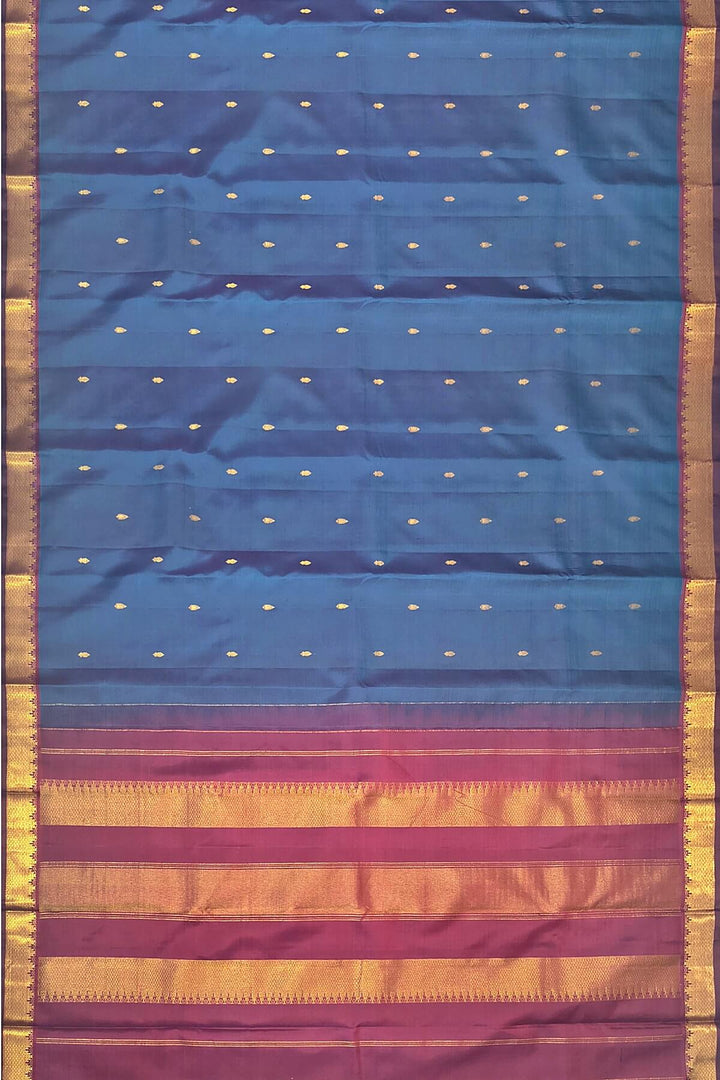 Kanchi pure silk saree in peacock blue with small motifs