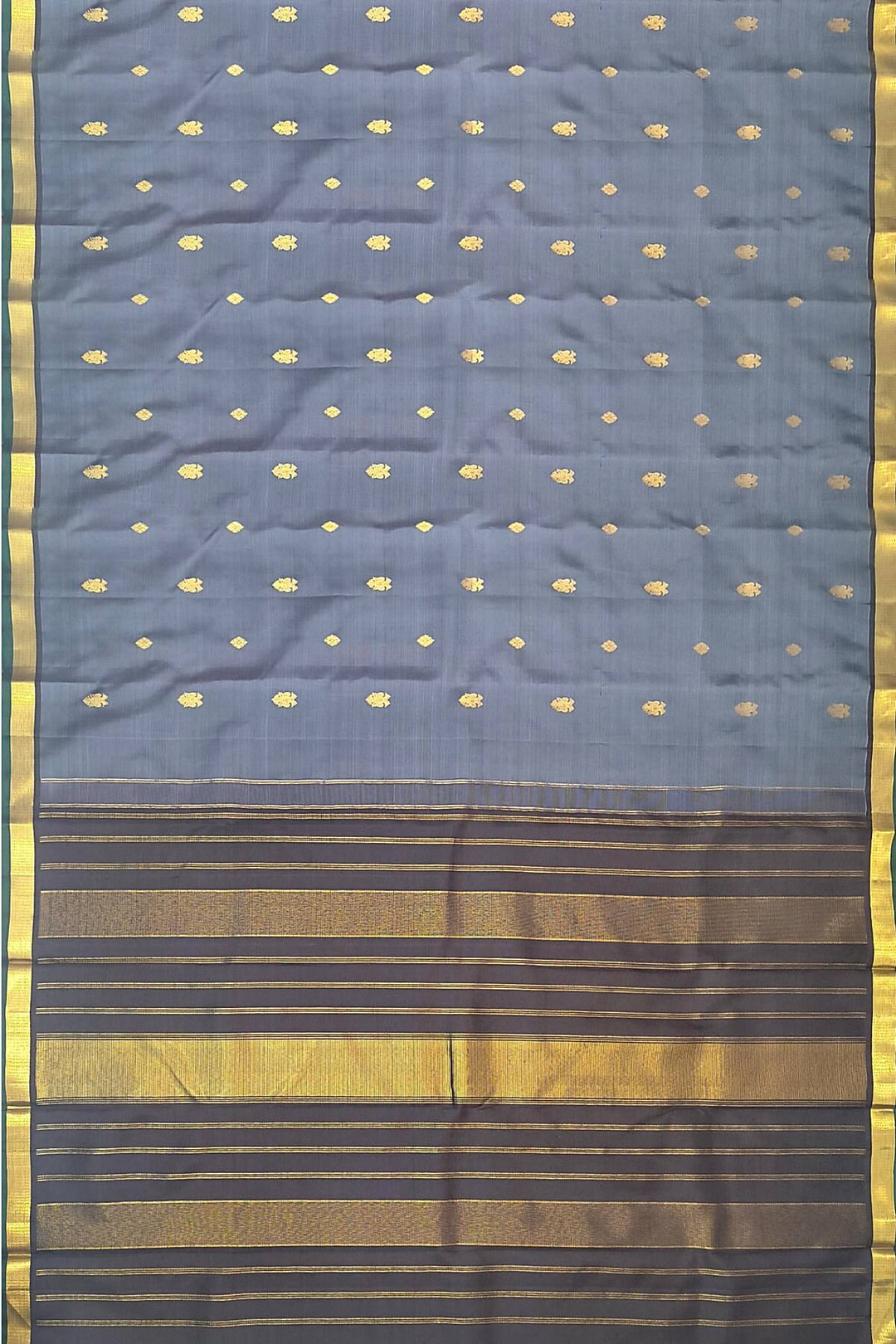 Kanchi pure silk saree in grey with small motifs