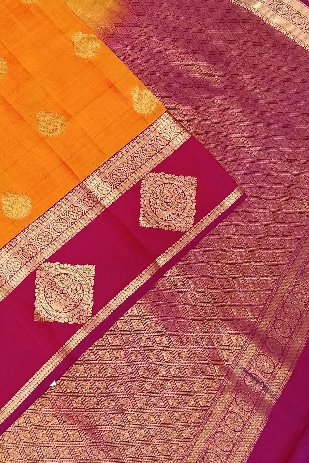 Kanchi silk saree in yellow with buttis