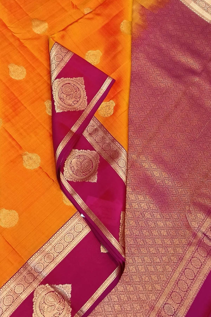 Kanchi silk saree in yellow with buttis