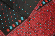 Mulberry pure silk saree in black with floral motifs all over the body.