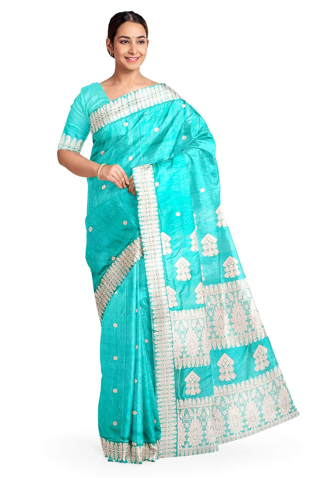 Mulberry pure silk saree in sea blue with floral motifs all over the body.