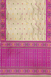 Mulberry pure silk saree in beige with floral motifs all over the body.