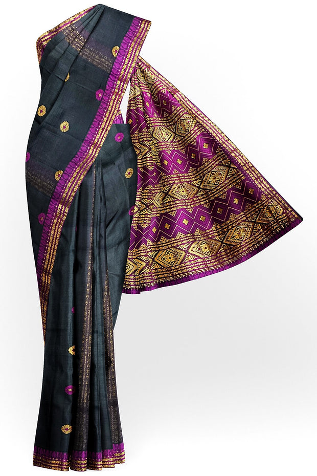 Mulberry raw silk saree in black with floral motifs all over the body.