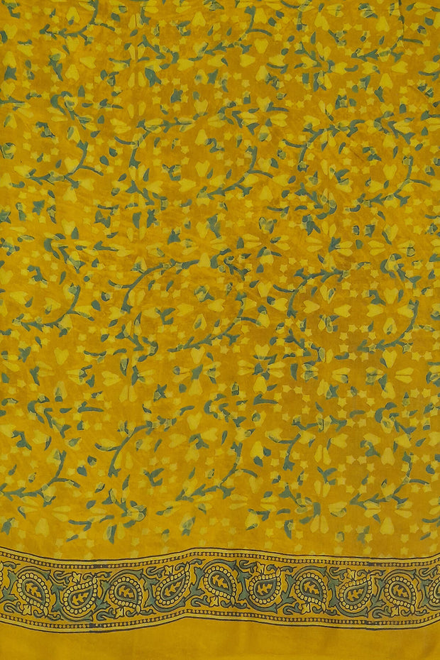 Modal silk saree in ajrakh block print in yellow  in floral pattern